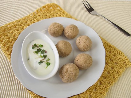 Tsampa balls with yoghurt and radish sprouts