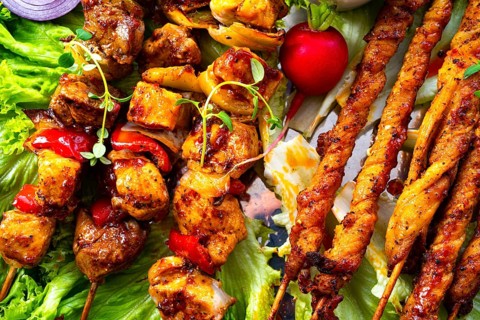 Grilled szaszlyk and meatballs with green salad