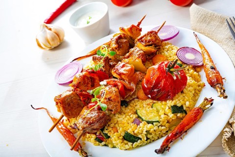 Kebabs with vegetables and bulgur