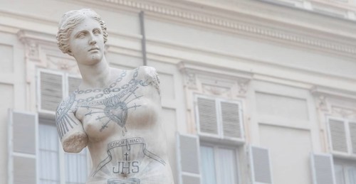 Turin, Italy, Circa January 2022: Venus de Milo with tattoos by Fabio Viale. White marble and