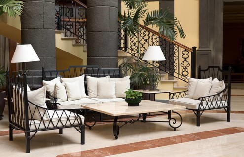 The lobby of the hotel with black columns