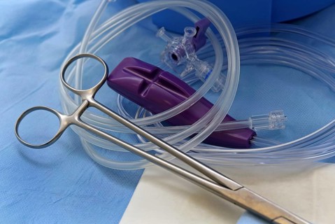 Grain tongs, three-way stopcock, medical tubing