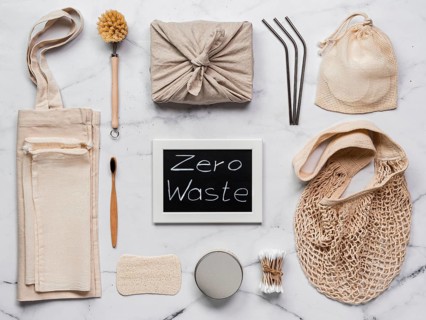 Zero waste concept. Textile wrapping gift, eco bags, metal straws, eco-friendly kitchen tools,