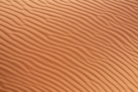 Scenic sand pattern on a desert's dune, drawn from the wind, Morocco