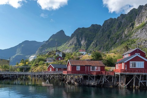 Village scene with traditional fishermen's houses, the so-called rorbuer, in the background the