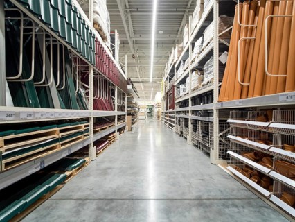 Store for home improvement and DIY. Warehouse aisle of building materials in industiral store.