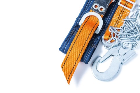 Construction tool safety harness isolated on white background
