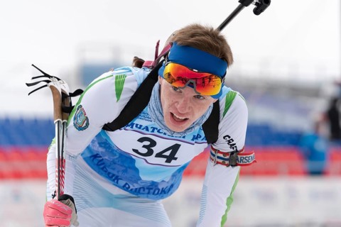 Russian sportsman biathlete Rusinov Vladislav Khanty-Mansiysk at finish after rifle shooting and