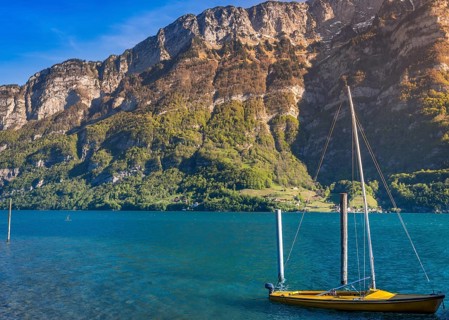 Image taken in the Murg Ost village, Switzerland, presenting a small boat on the Walensee lake in