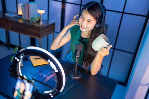Content creator Young asian woman influencer creating content in home studio entertainment and