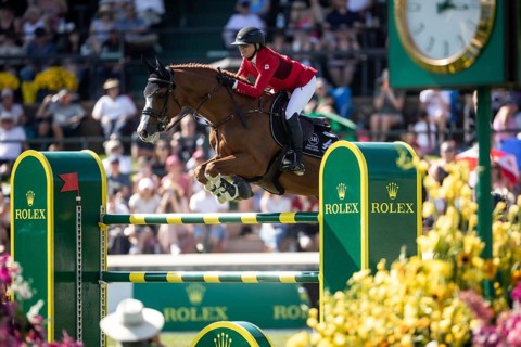 Erynn Ballard of Canada and riding De Flor 111 Z Santa Rosa compete in the first round of the 1.60m