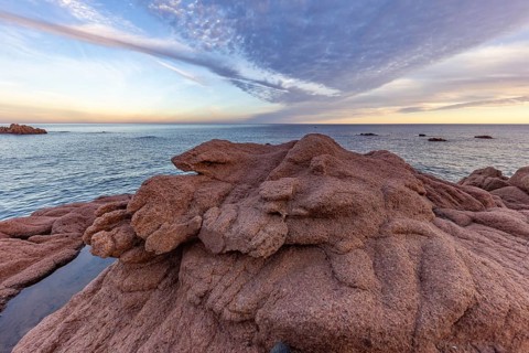 Coastal landscape with bizarre red rocks and sea view, Spiaggia di Cala E'Luas, Ogliastra,