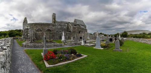 Ballyvaughan, Ireland, 28 July, 2022: panorama view of the historic 13th-century Corcomroe Abbey