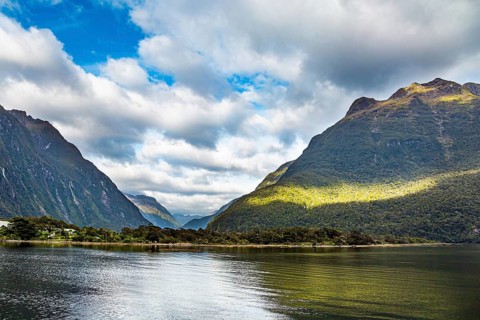 The famous fjord Milford Sound, of glacial origin. New Zealand. South Island. The magical nature of