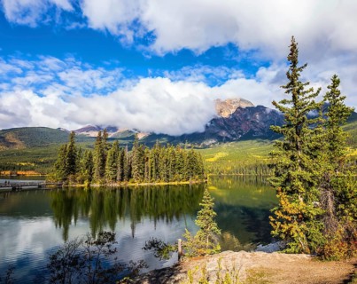 The clear autumn morning in Jasper National Park, Canada. Charming little island in the Pyramid