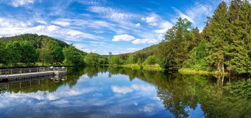 View at a lake in the Spiesswoogtal valley near the German village Fischbach bei Dahn in the