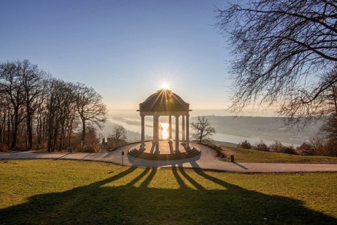 Beautiful temple in a landscape shot. Sunrise on a winter morning. Beautiful view along the Rhine