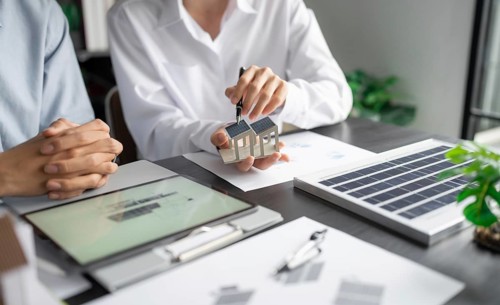 Solar panels green energy Business man working green eco friendly office business creative idea