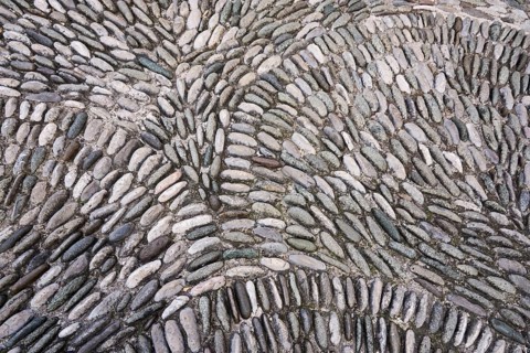 Pattern of pebble paving on the Stari Most bridge, Old Town of Mostar, Bosnia-Herzegovina
