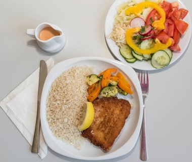 Cordon bleu filled with cheese and ham with salad - Schnitzel, bird's eye view