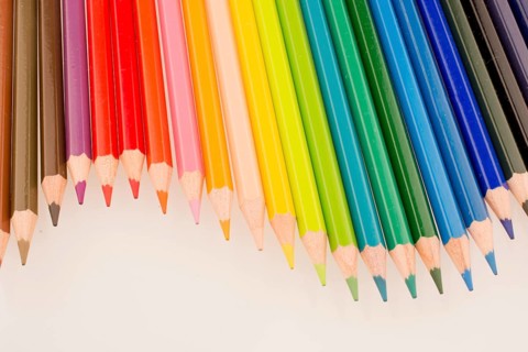 Color pencils of various color on a white background