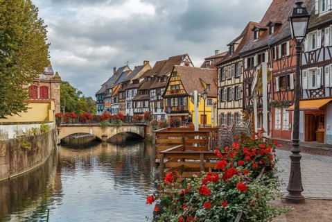 Embankment of Lauch River with historical houses in Colmar, Alsace, France