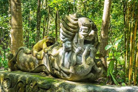 Monkey sculpture in sacred Monkey Forest park, Ubud, Bali, Indonesia