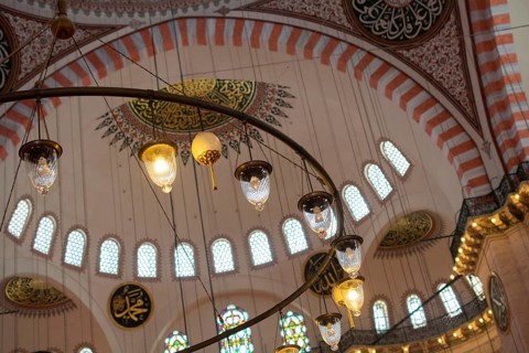 Bright Lamps on circular chandelier in a big mosque