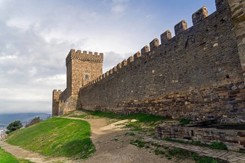 Genoese fortress in Sudak, Crimea.The Citadel and the wall of the upper tier of defense. Cloudy