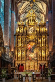 Closeup on amazing, golden and ornate altar of Church of the Assumption of the Blessed Virgin Mary,