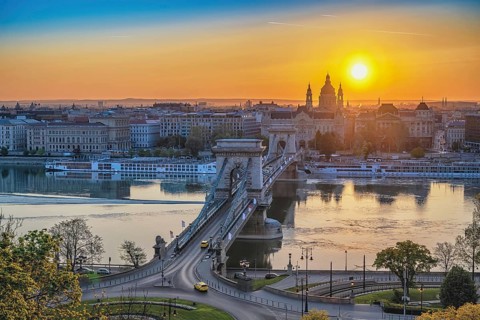 Budapest Hungary, city skyline sunrise at Danube River with Chain Bridge and St. Stephen's Basilica