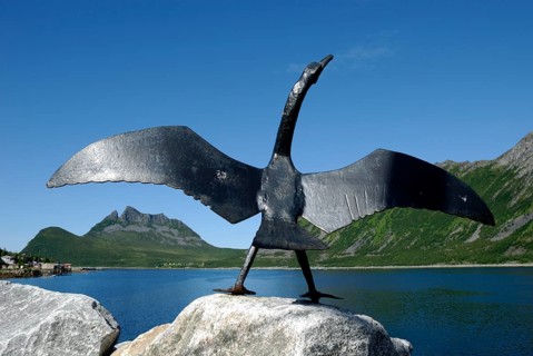 Sculpture of a cormorant at the harbour in Gryllefjord, Senja, Troms, Norway