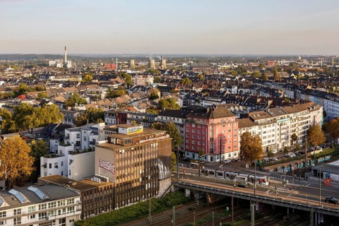 View over Düsseldorf, Wehrhahn stop on Grafenberger Allee, in the background the cooling towers of