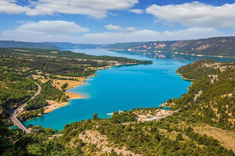 Magnificent lake with turquoise water among wooded hills. Canyon of Verdon, Provence