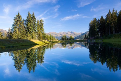 The lake on the top above alpine village of Alpbach and the Alpbachtal (Alpbach valley), Austria