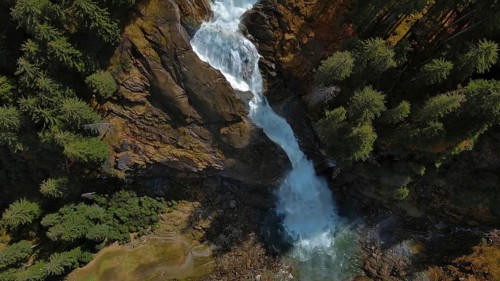 Aerial view of Krimml Waterfalls on sunny day. High Tauern National Park, Austrian Alps, Austria