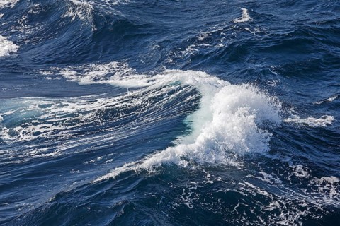 Wave with foam crest on the atlantic ocean during stormy wind and rough sea Rough sea with breaking