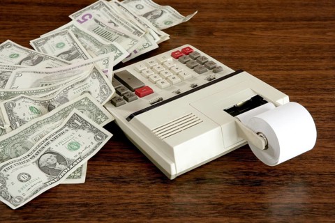Dollar notes calculator accountant office vintage retro wooden table