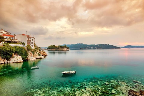 The sunrise at the old port in the Chora of Skiathos island, Greece