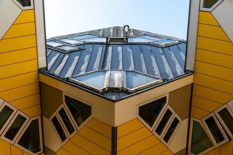 Rotterdam, Netherlands, May 8, 2022: Yellow cubic houses in Rotterdam. The Cubic Houses were