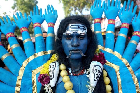 Man dress as Hindu Goddess Kali near Mutharamman temple, Tamil Nadu, India, Asia