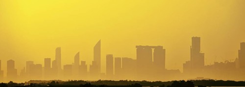 Sandstorm, samum, haboob over the southern megalopolis, the outline of skyscrapers are drowning in