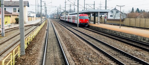 Austria, Upper Austria, Linz, Wels . Railway tracks seen from a moving train between Linz and Wels