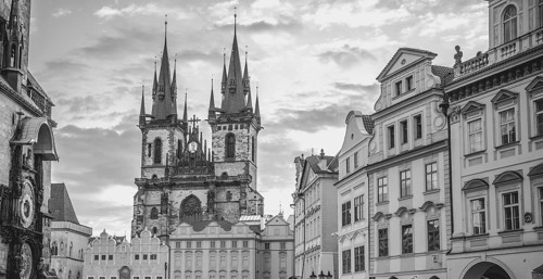 Black and white image with the Church of our Lady before Tyn and other historical buildings from