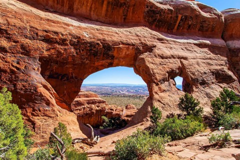 Double O Arch. The beauty of Arches Park in USA. Picturesque red-brown sandstone cliffs form a