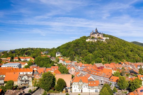 Aerial view of the district Nöschenrode with castle, in the foreground half-timbered houses Schöne