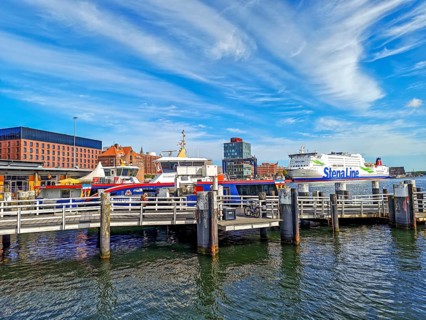 Maritime atmosphere in the harbour at the end of the Kiel Fjord, jetty, liner ships, Sweden ferry