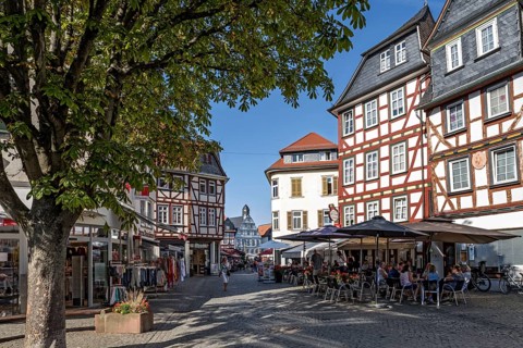 Shops, shops, street cafés, half-timbered houses, busy shopping street, Weiseler Strasse, old town