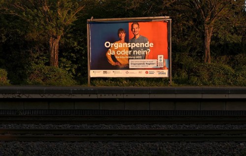 Advertising along a railway line, advertising poster for organ donation, organ donation register,