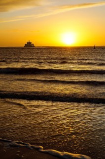 Intense sunset on the west beach of Norderney, Lower Saxony, Germany
